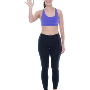 Beautiful female in sports clothing is waving