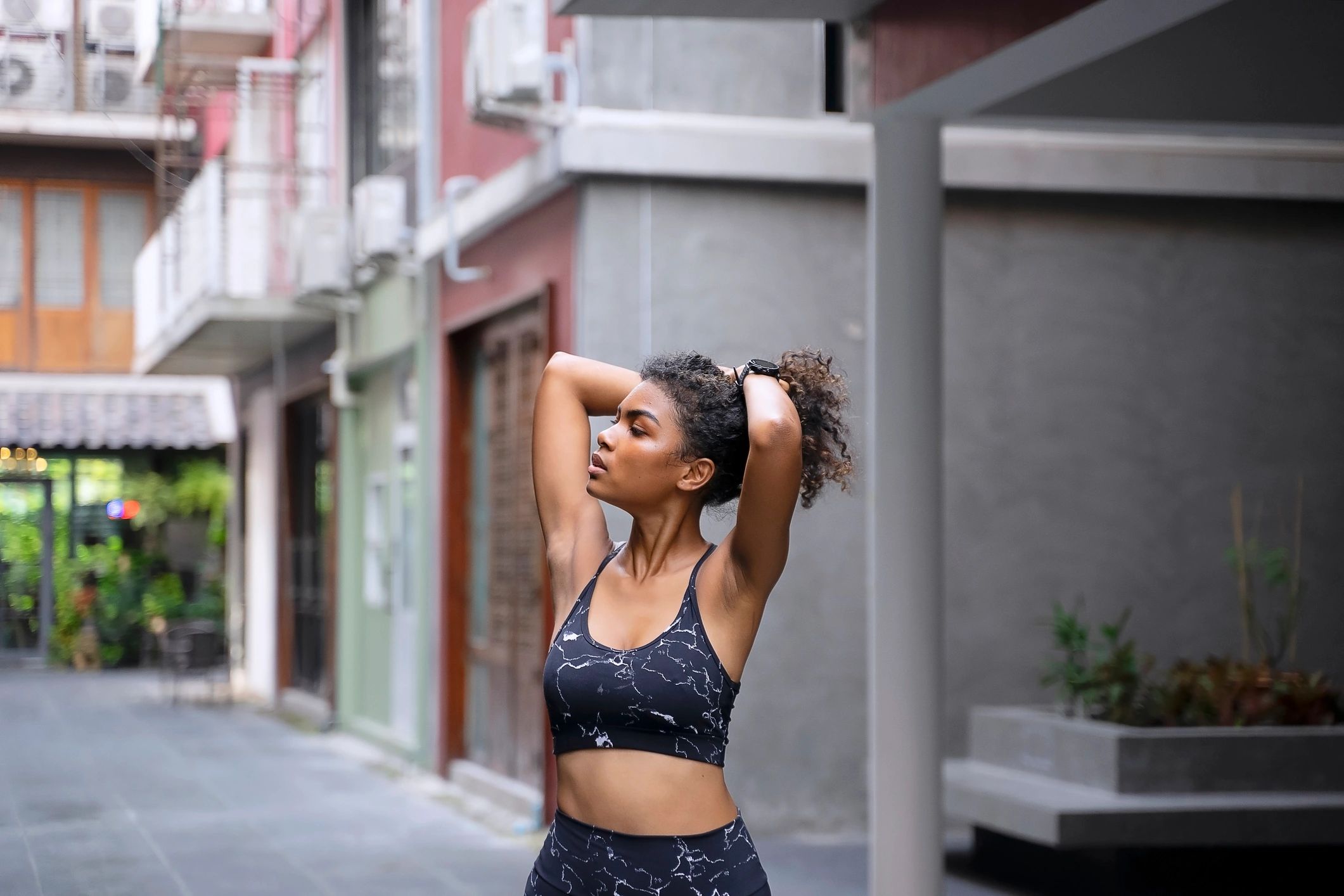Woman in athleisure apparel moving through the city